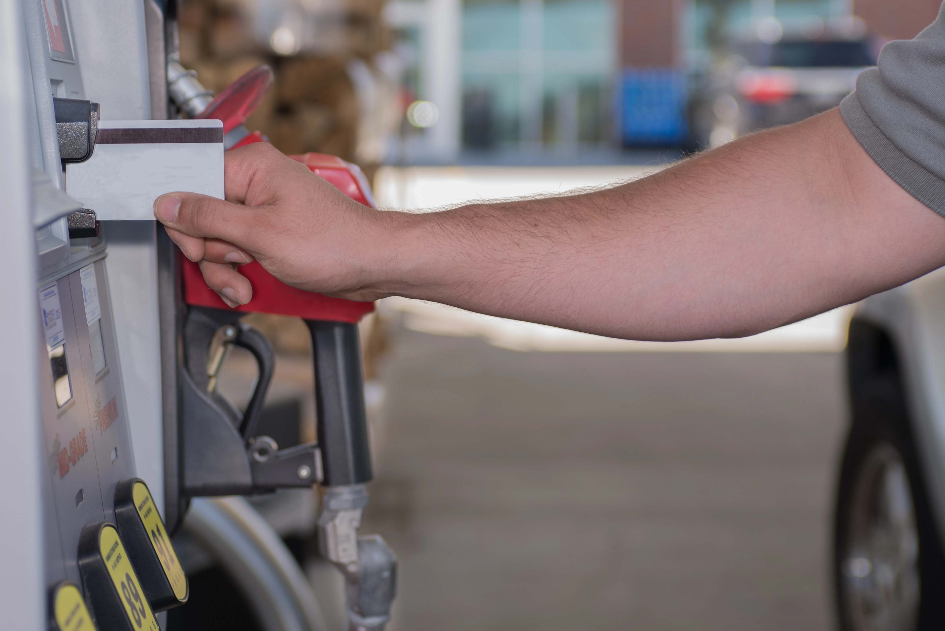 A driver swiping their fuel card