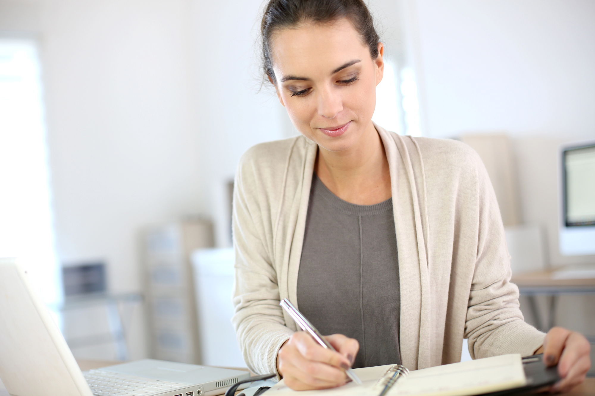 a self-employed worker organizing their requirements for a loan application
