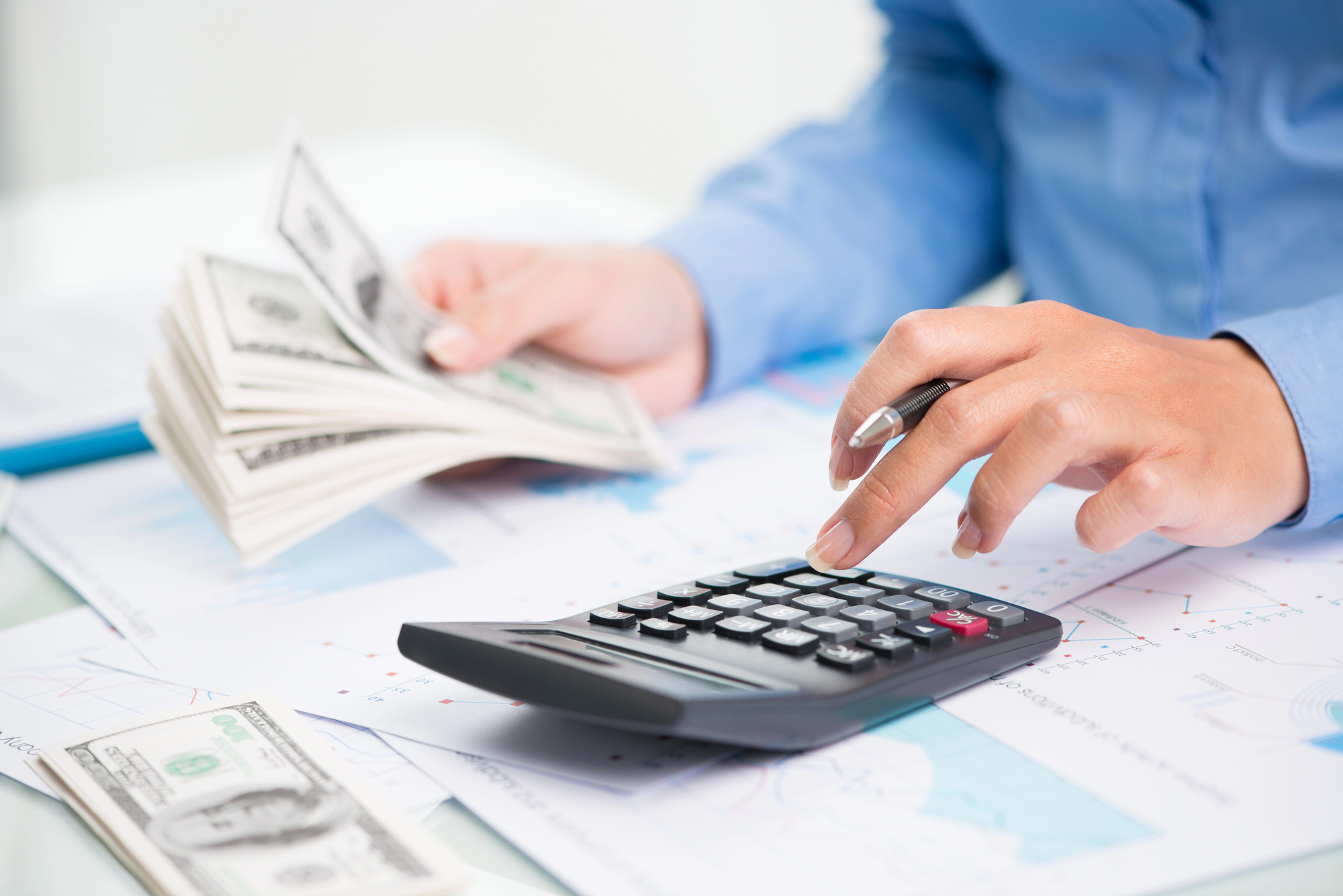 freelancer counting the money received from funding
