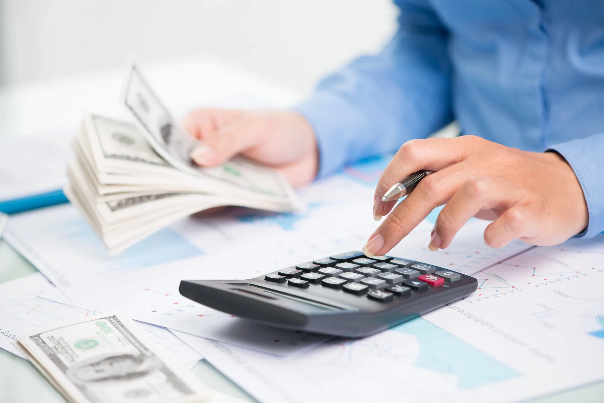 freelancer counting the money received from funding