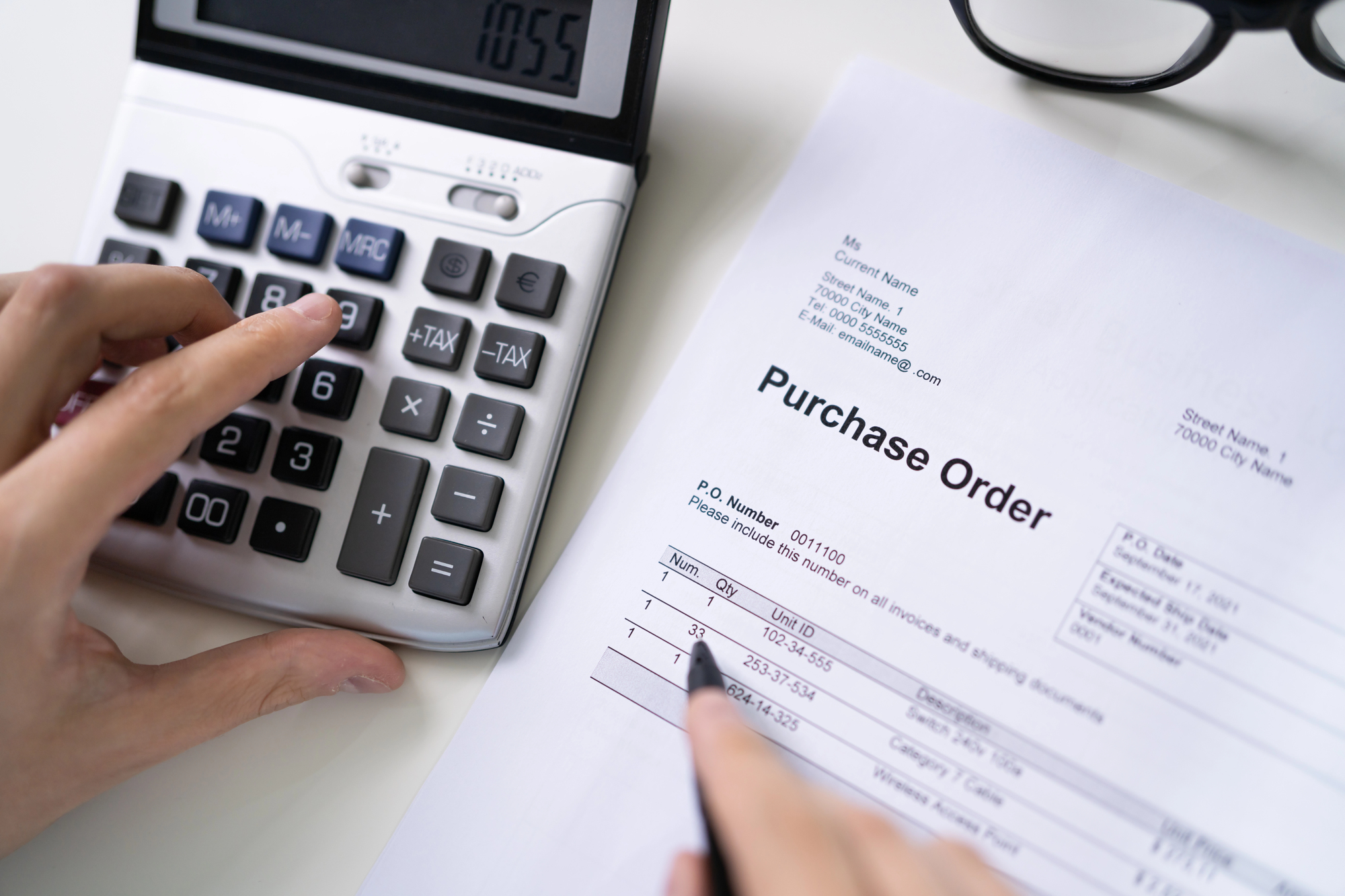 an amazon seller checking their purchase order document