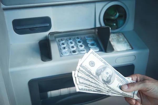 freelancer withdrew a huge amount of money from the ATM