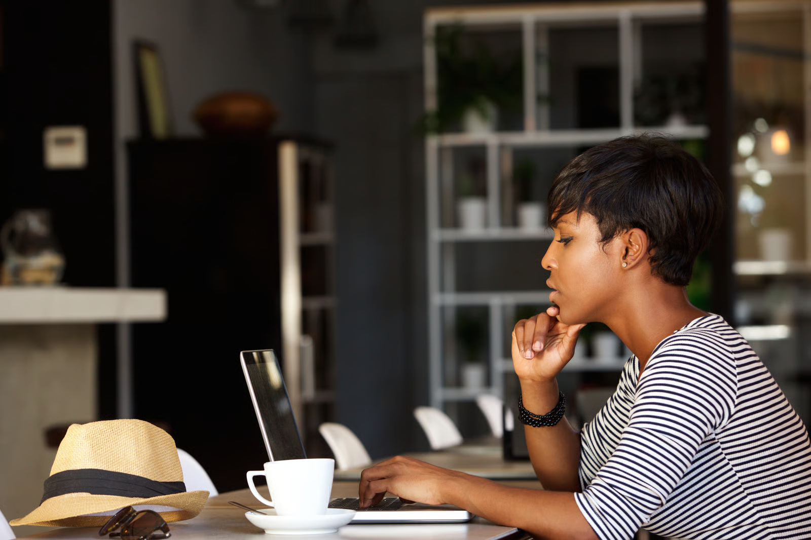 freelancer thinking deeply about which type of funding to apply for