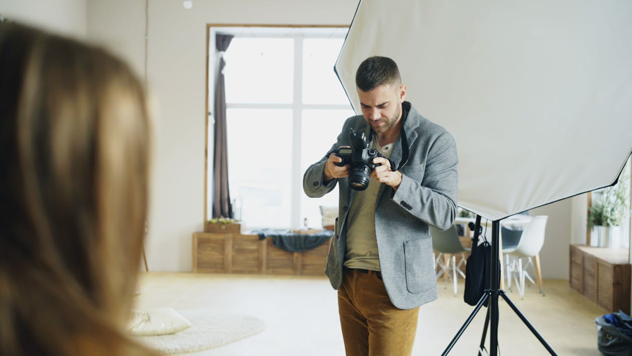 photographer looking at the shot they just took