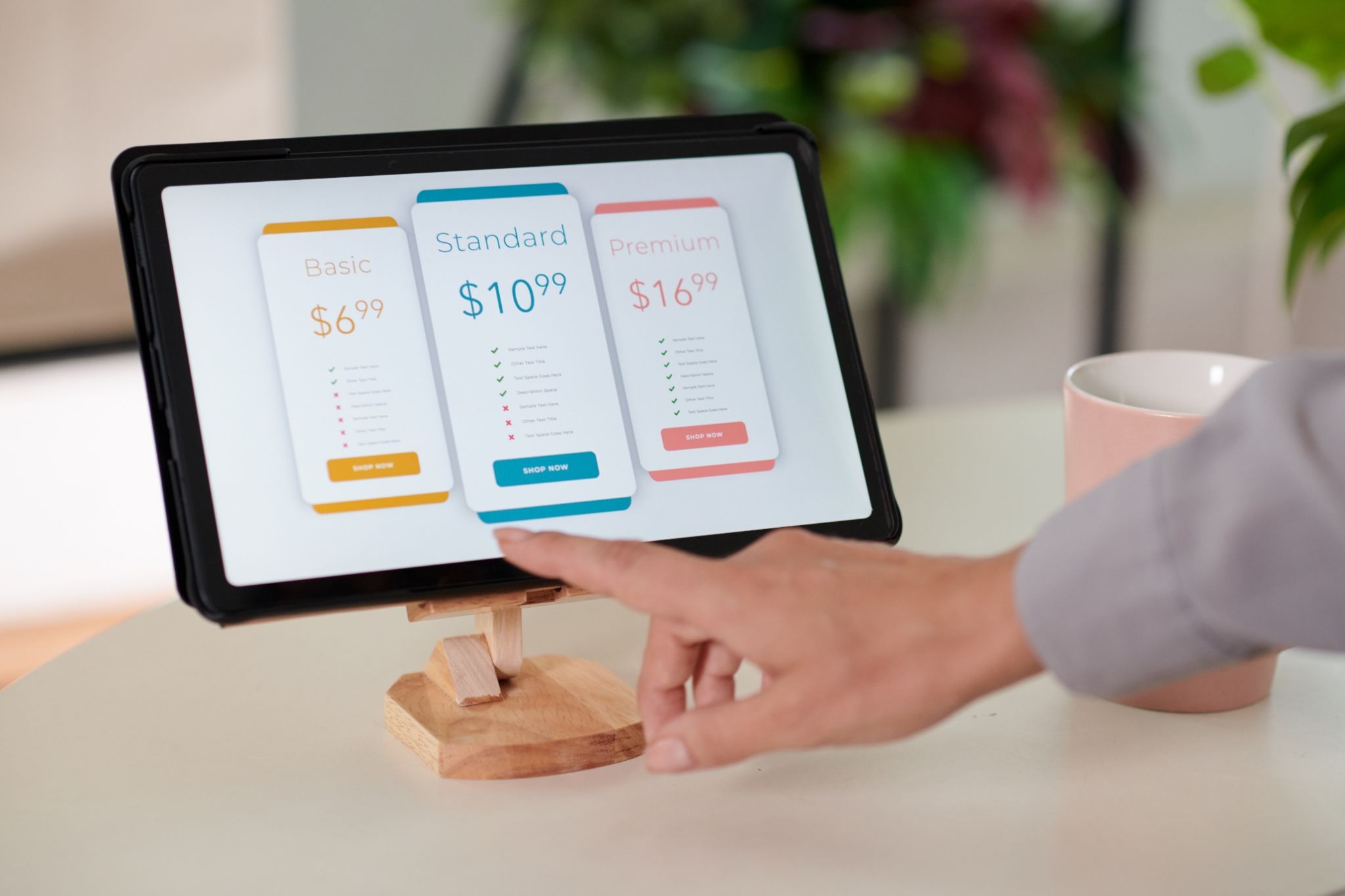 Gig worker reviewing online platform subscription and service fees on a tablet