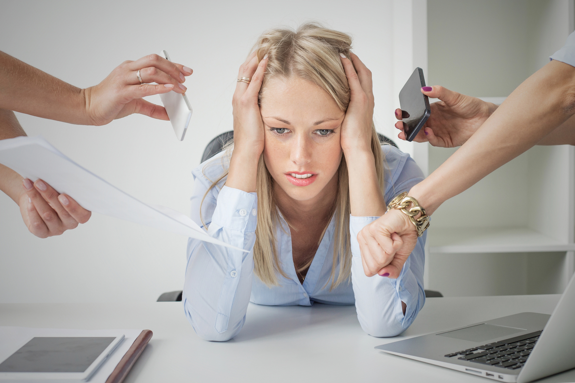 freelancer feeling stressed and burned out from working multiple jobs