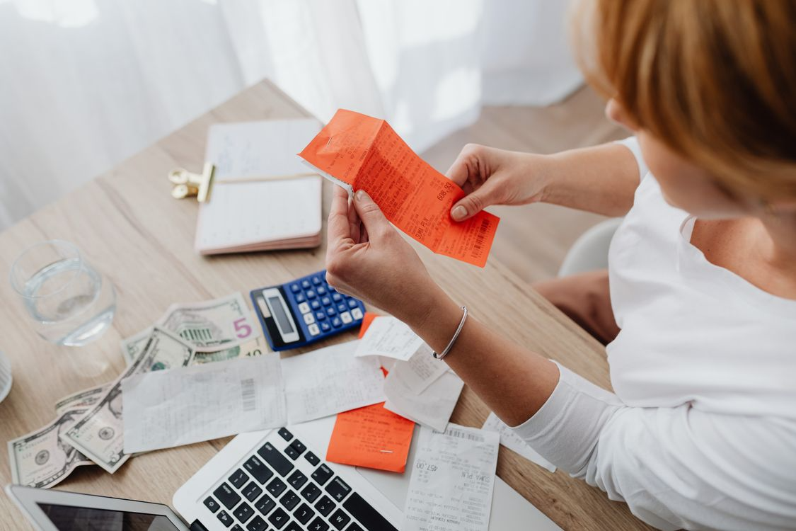 gig worker looking over their car expenses and keeping records