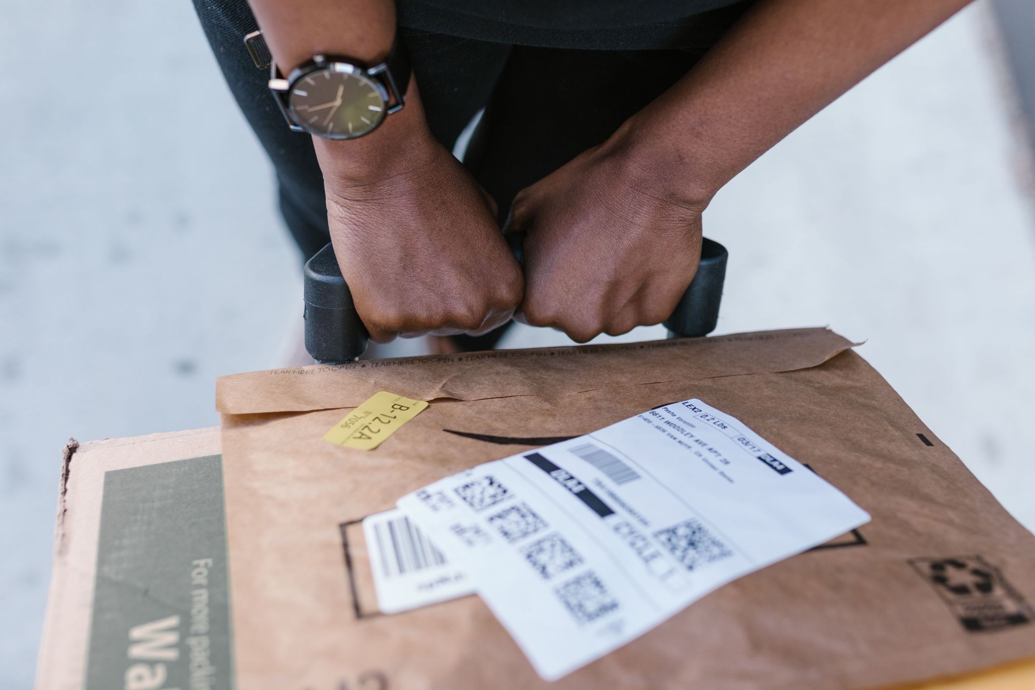  Independent delivery courier delivers packages within their assigned area 